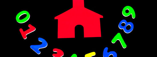 Little red school house with colorful numbers