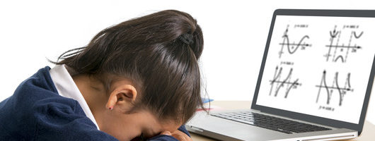 sweet little school girl with ponytail bored and tired with computer maths homework and studying in children education concept isolated on white background